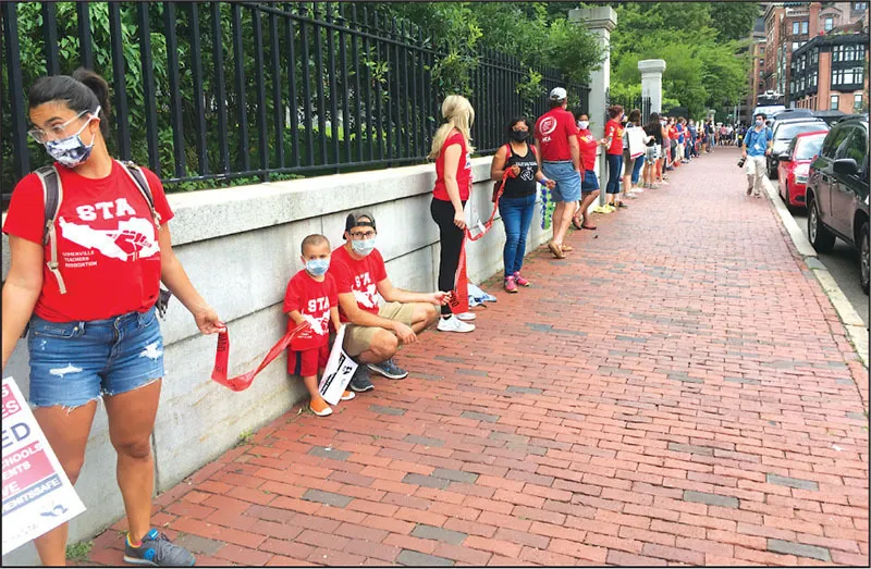 Hundreds of educators and their family members, joined by community allies, rallied at an #OnlyWhenItsSafe event outside the State House on Aug. 19.