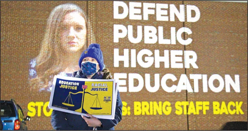 MTA members teamed up with projectionists from The Illuminator, an arts-activist group, to display messages on campus and municipal buildings.