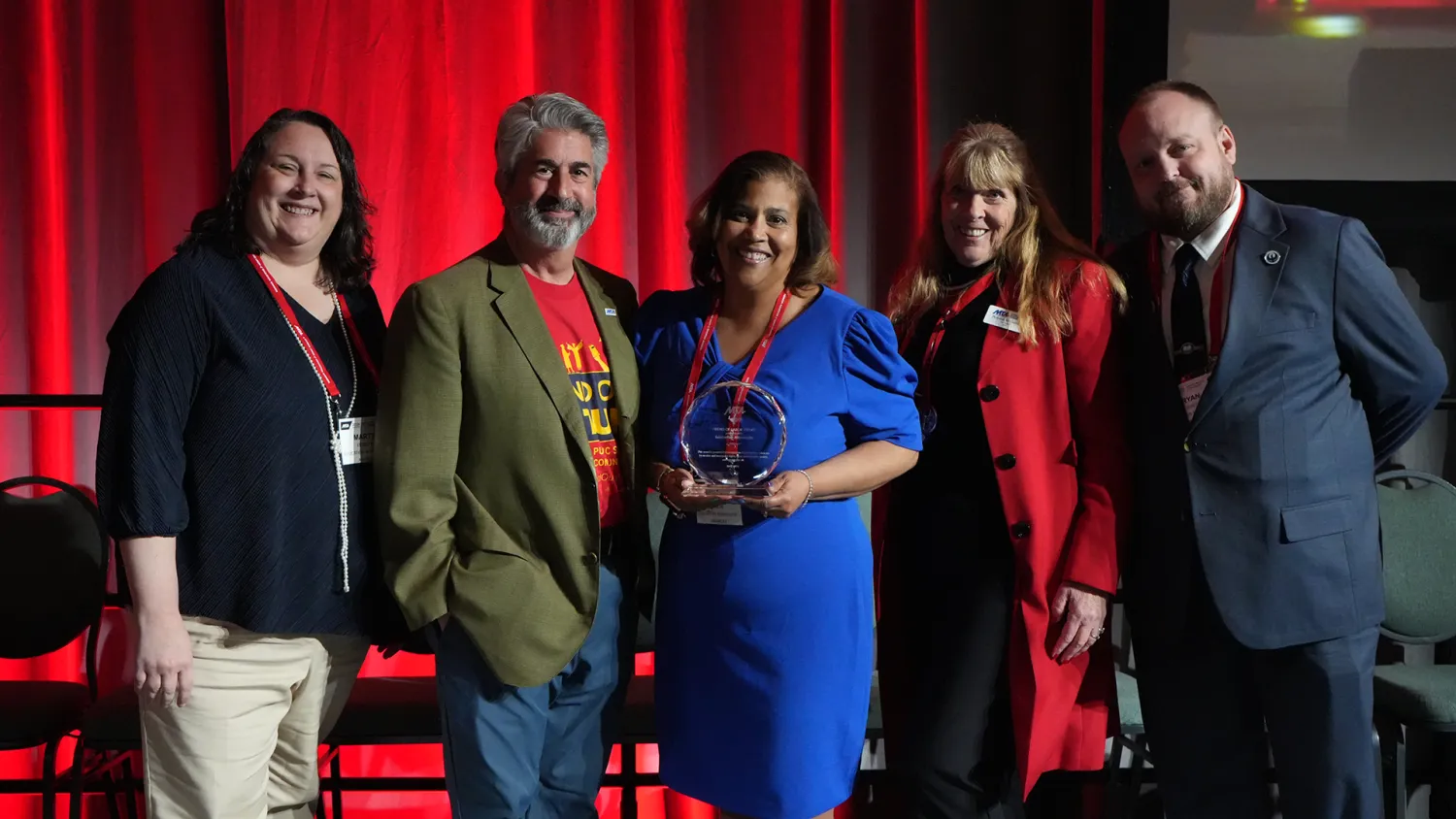Education Minnesota President Monica Byron accepted the award, accompanied by Vice President Marty Fridgen and Secretary-Treasurer Ryan Fiereck