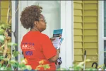 Tracey Pratt, a member of the Cambridge Education Association, canvassed in a Somerville neighborhood in mid-May.