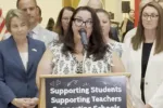 Woburn Teachers Association President Christy Nickerson represented the MTA at a State House press conference on July 15 2026.