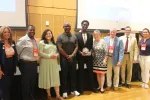 Award winners Dr. Marianela Rivera and Bendeshe Bonner flank Jamaal Bowman joined by family and MTA members and leaders at the Human and Civil Rights Awards.