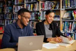 New Bedford graduates Elliott Talley and Kibi Williams-Brown. Williams-Brown is now an English teacher at New Bedford High School
