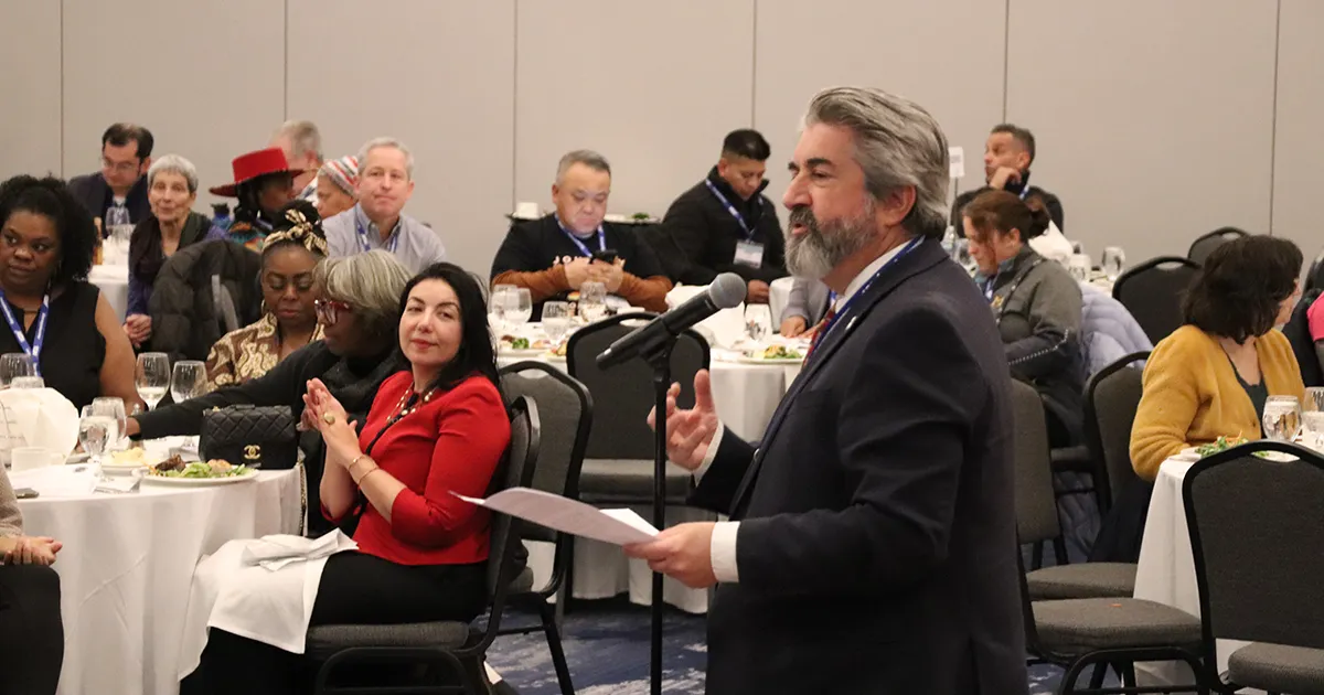 Max Page speaking at dinner