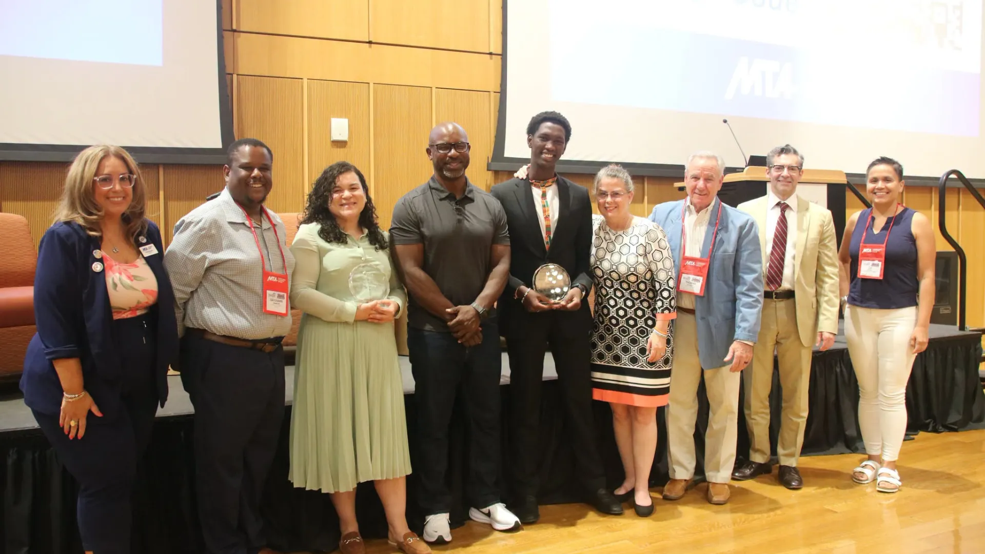 Award winners Dr. Marianela Rivera and Bendeshe Bonner flank Jamaal Bowman joined by family and MTA members and leaders at the Human and Civil Rights Awards.