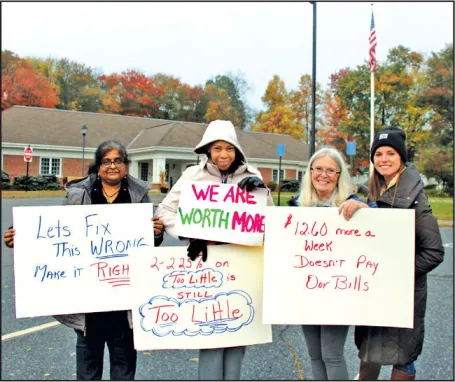 Paraprofessionals and their supporters held a rally on Oct. 27 outside Shrewsbury Town Hall to spread awareness about how little they earn as educators