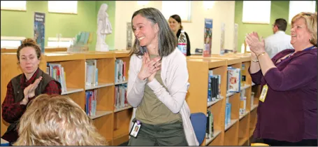  Sonia Fortin reacted with surprise to being named MTA’s 2020 MTA Education Support Professional of the Year during a Sudbury Education Association meeting. 