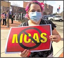  Medford teacher Sara Dion joined a protest outside DESE headquarters