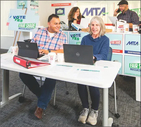 MTA members are making phone calls and having one-on-one conversations about the Fair Share Amendment as the campaign gathers momentum. Seated in front are Ismael Colón, a middle school Spanish teacher in Waltham, and Sheila Hanley, a retired educator who worked in Randolph and Newton. Standing are Deb Gesualdo, president of the Malden Education Association, and Saul Ramos, an Education Support Professional in Worcester.