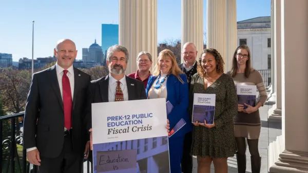 MTA leadership and members at the State House delivering a signature drop to protest education cuts.