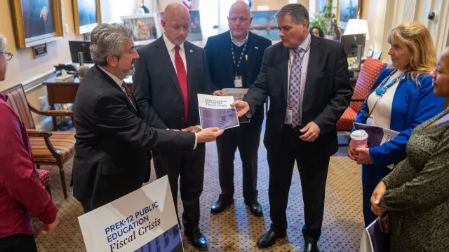 Today, a delegation met with the governor's staff to deliver a letter calling for an immediate fix to the statewide school funding crisis.