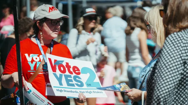 MTA staff at the Melrose market advocating for the Yes on 2 ballot question shortly before the November 2024 election.